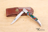 Folding knife with its multicolor handle in resin