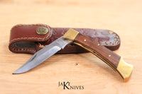 Click to open folding knife