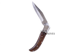 Folding knife with its dark brown wood made handle