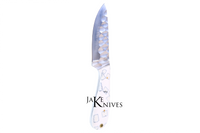 Hunting knife with its white resin handle