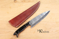 Kitchen knife with it's Damacus blade