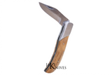 Folding knife with its wood made handle