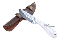 Hunting knife with its white resin handle