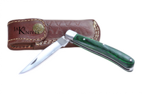 Folding knife with its green wood handle