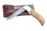 Folding knife with its wood made handle