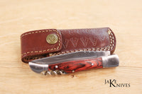 Folding knife with corkscrew