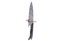 Kitchen knife with it's Damacus blade