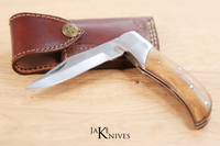 Folding knife with its wood made handle