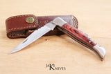 Folding knife with corkscrew