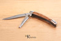 Dual folding knife with a saw